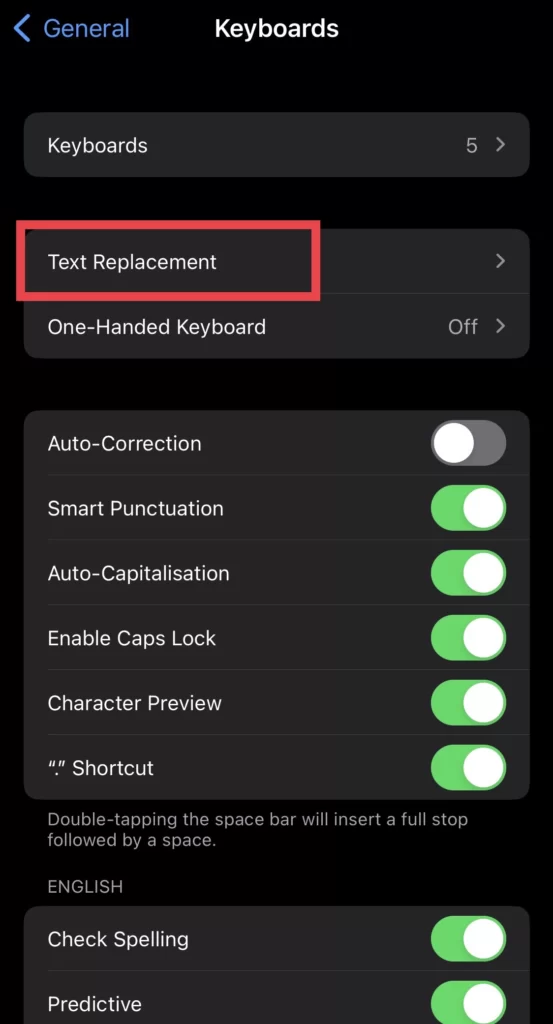 Next, tap on Text Replacement.